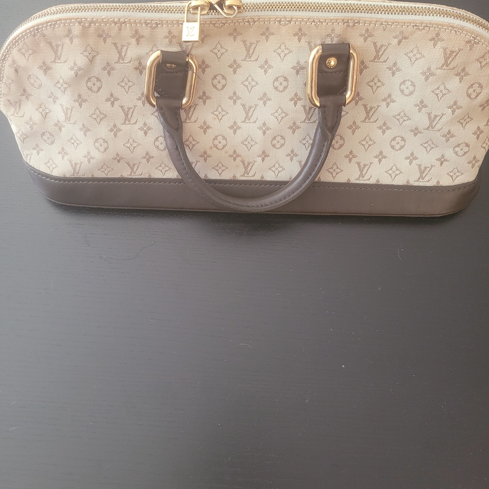 Louis Vuitton Black & Ecru Fabric Canvas. Logo Mini. Firm Price